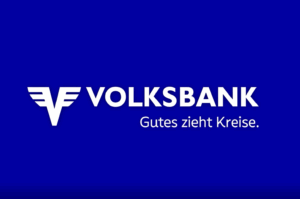 Das weiße Logo der Volksbank mit dem Text: Gutes zieht Kreise